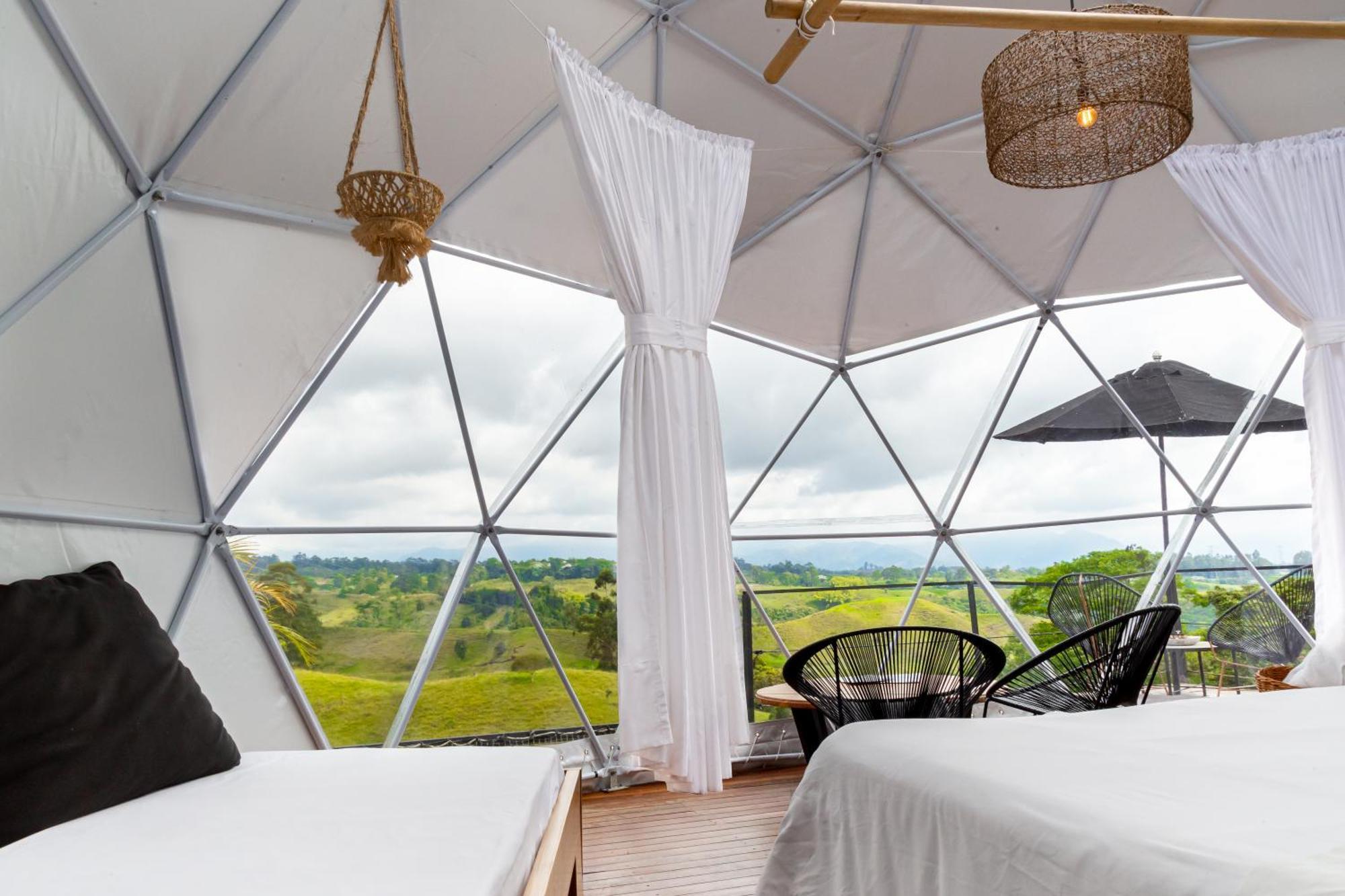 Ecohotel Monte Tierra Habitaciones Y Glamping ฟิลานเดีย ห้อง รูปภาพ
